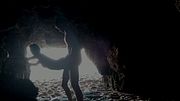 Couple recorded at the beach, inside the cave