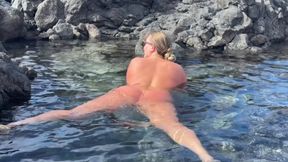 Nudist Girl Swimming Naked in the Natural Pool Outdoor