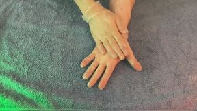 Hands in Latex Gloves - Moisturising and Rubdown