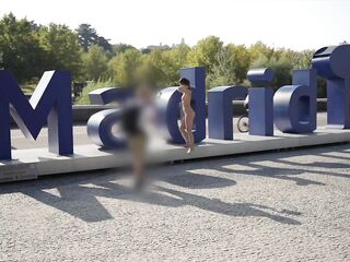 Walking Absolutely Nude Around the World Noted Madrid Sign... Surrounded by People