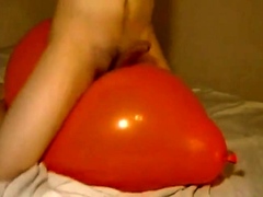 Big inflatable orange balloon humping cum