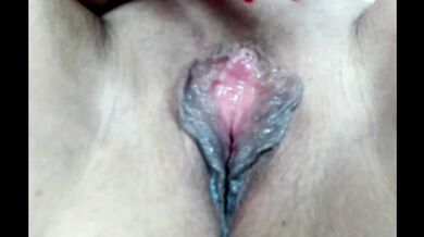 Very close-up shots of a mature slut's pussy with purple hair and other parts of her slutty body...))