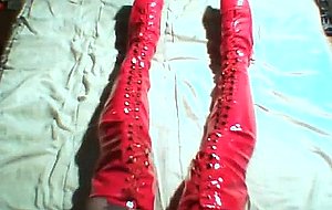 Crossdressing lady in latex