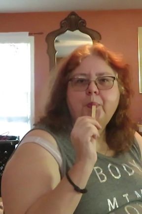 BBW redhead Mature Nurse vicki  licks and sucks on an ice cream