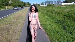 Slut Lucy Raven walking nude at a public road