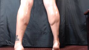 Oiled calf flexing tiptoeing