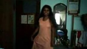 Natural dark skinned lady from India flashed her tits and butt while stripping