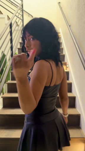 Teasing GF teases in a latex dress while going upstairs