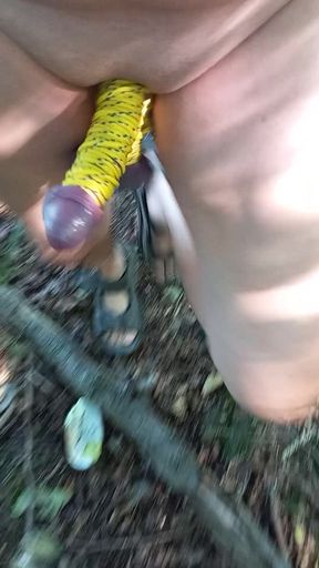 Naked with tail and eggs tied in nature.