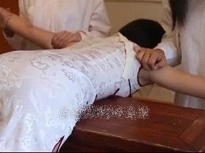 Asian girl gets a tradittional spanking punishment