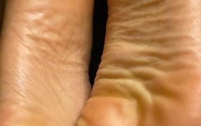 Extreme Close-up of Pink Foxx's Soles