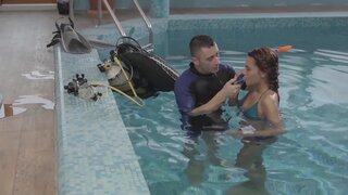 Alexis Brill and diving instructor are making out by the pool