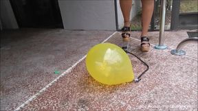 Nasty girlfriend uses tire pump to pop balloons