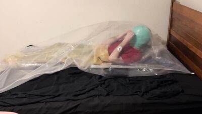 Dec 13 2023 - VacPacked in my latex sleepsack with hard breathplay in RubberDogBronco's jade head balloon