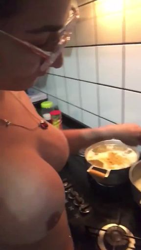 Adriana cooking diner naked