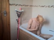 sexy skinny blonde teen takes a bath and wets his hair and cock