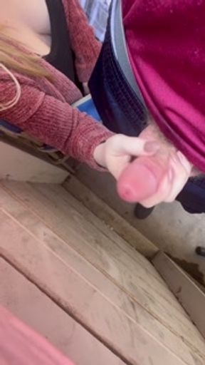 babysitter slut enjoys cum and jerking cock off too much on apartment patio during a busy Saturday