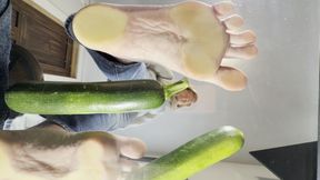 Foot crushing yellow squash under glass POV Giant