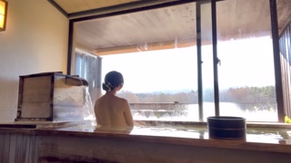 At a hot spring with a view of Mt.
