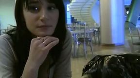 Brunette enchantress with yummy tits blows two cocks in a mall