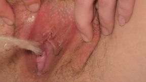 Closeup of my hairy, pissing pussy