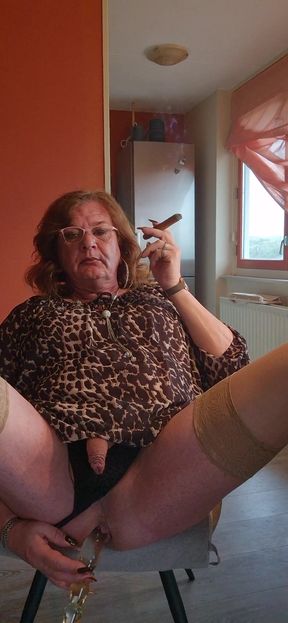 Captivating moment from &quot;Enjoying my glass dildo while smoking a cigar&quot;