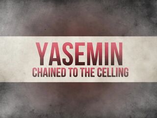 Yasemin manacled to the ceiling