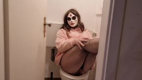 Young trans woman jerks off in the toilet
