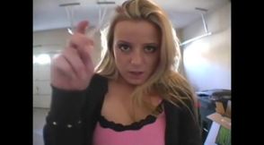 Blonde bitch smoking a cigarette in a close up video