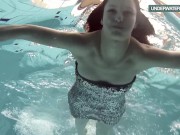 Loris blackhaired teen swirling in the pool