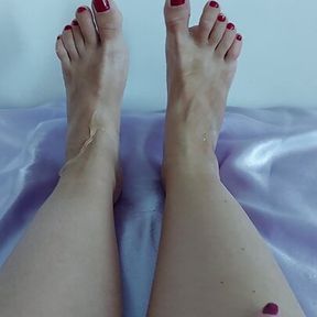 Foot fetish with red varnish, lubricant and spitting