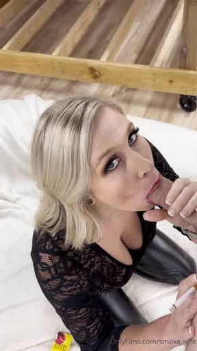 Smoking blowjob in leather leggings