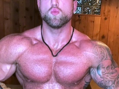 Cocky Oiled Up Muscle Bear Flexes You!