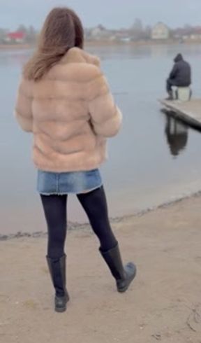 Walking along the beach without panties.