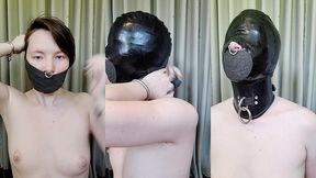 layered vetwrap, latex hood, and stiff leather posture collar. watch me take away my voice and my vision, and muffle my heari...