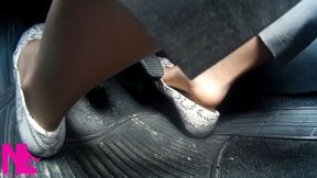 Driving my bcar and popping my hosed heels off the snake designed flats