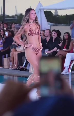 Fashion show model strutting runway