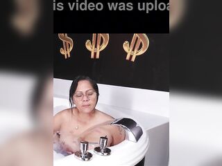 OLDER WENCH IN THE JACUZZI