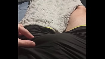 Guy fondles his dick through his panties