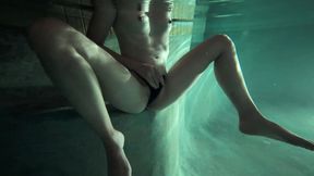 petite white girl fingering pussy outside in pool