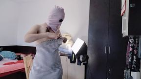 Hot wife has fun trying on clothes she cuts. Sexy mom dances naked at home