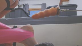 Man in chastity with pink latex stockings enjoys machine &amp; fisting