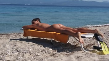 Nudist babe flies drone while showing off her body