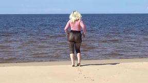 funny milf with nylon ass and tits on beach