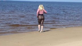 funny milf with nylon ass and tits on beach