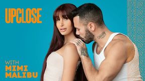 Hot redhead Mimi Malibu gets drilled and pleasured