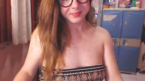 Blonde Shemale sucking a huge Dildo