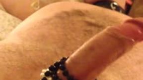 Miss M handjob on a naked man tied to her bed