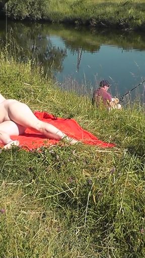 Captivating moment from &quot;Wild beach. Sexy MILF Platinum naked sunbathing on river bank, random fisherman guy watches. Naked&quot;