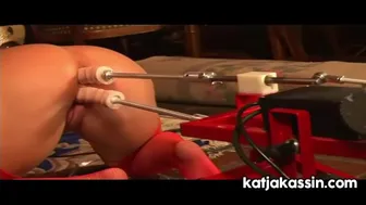 Redhead Katja Kassin masturbates with a fetish dildo machine and strap on
